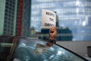 - New York passes landmark ride-hail service regulation